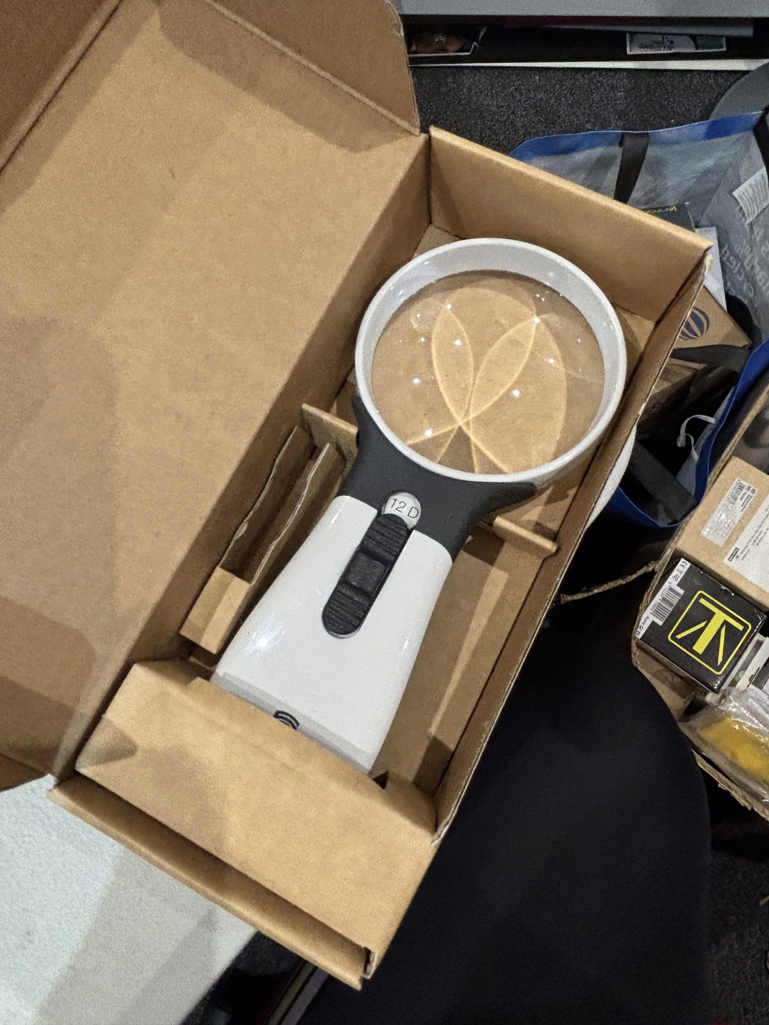 3x Hand Mag Talking grey cube shaped clock with yellow button to the top